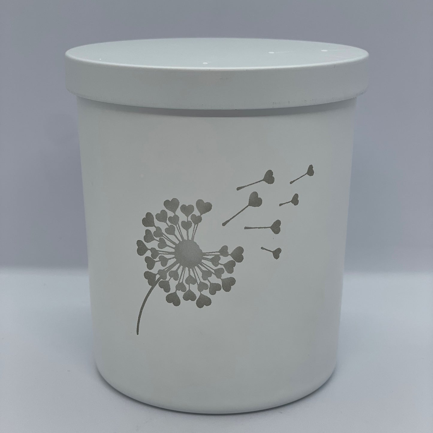 white jar with flower
