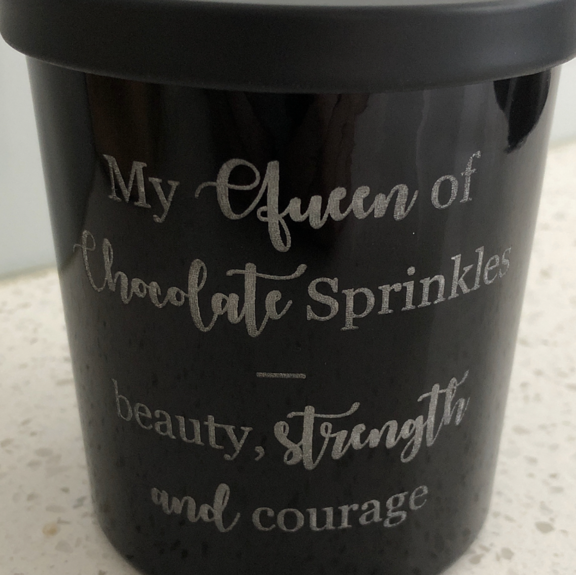 Black candle jar with message engraved